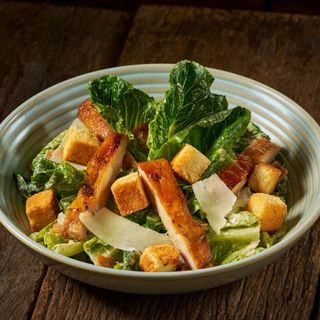 Organic Caesar Salad with Juicy Grilled Chicken Thigh